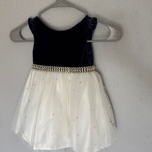 Elegant Navy and White Dress with Beaded Waist